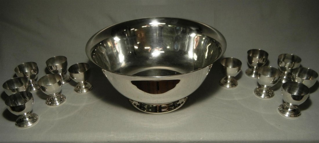 Sterling Silver Punch Bowl & Cups: Reed & Barton sterling silver punch bowls and 12 cups. All pieces are marked, "Reed & Barton Sterling" and "Paul Revere Reproduction." Total gross weight is: 95.33 T.O.
