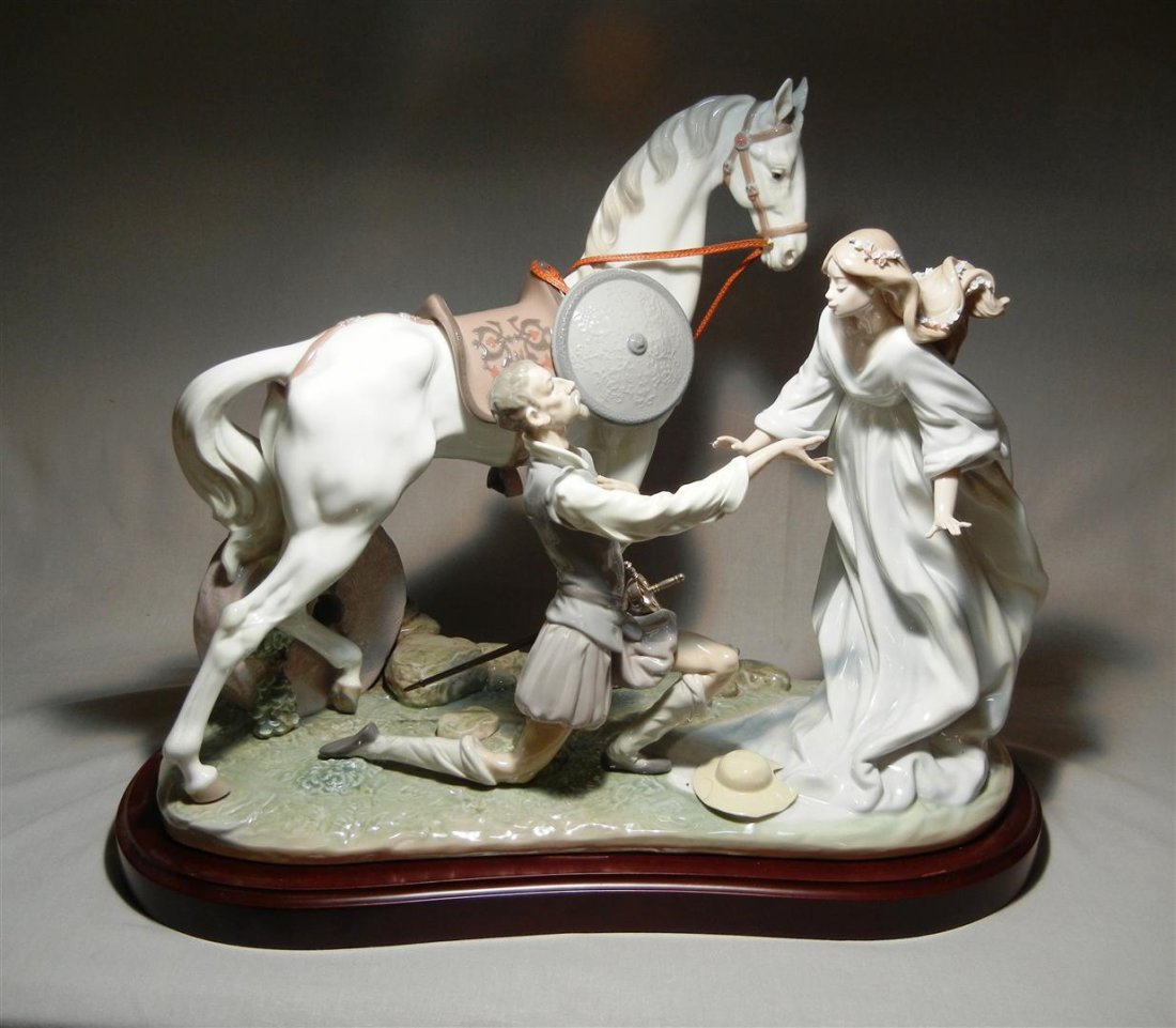 Lladro "Conquered By Love" : Lladro figural group entitled, "Conquered By Love" by Antonio Ramos circa 1994 and retired in 2004. Limited edition number 197 out of 2500 pieces. Lladro figural group measures 16 1/2" x 20 3/4."