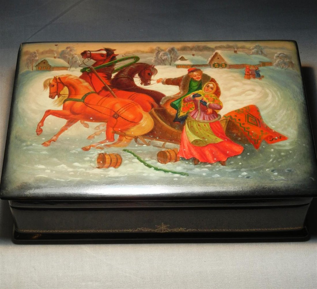 Russian Lacquer Fedoskino Box: Russian lacquer Fedoskino box with "Fedoskino Pegockuno" on inside lid (see photo). Box also comes with paperwork and measures 2 1/2" x 7 1/2" x 5."