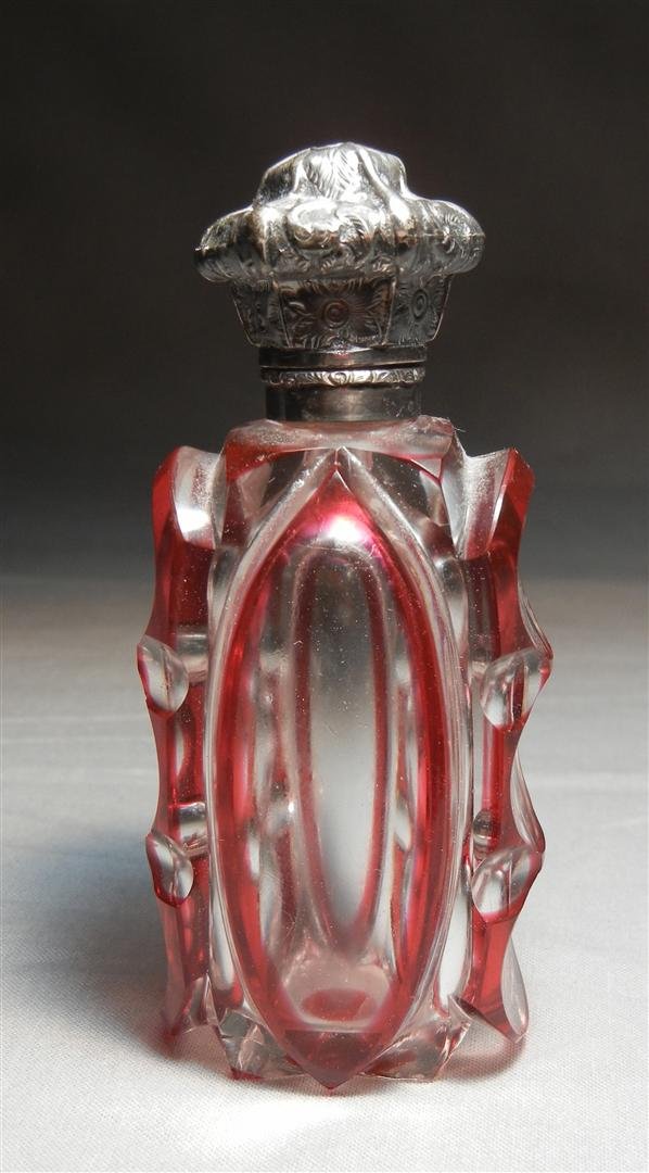 Sterling & Clear Ruby Perfume Bottle: Bohemian cut clear ruby perfume bottle with sterling top measuring 4"H.