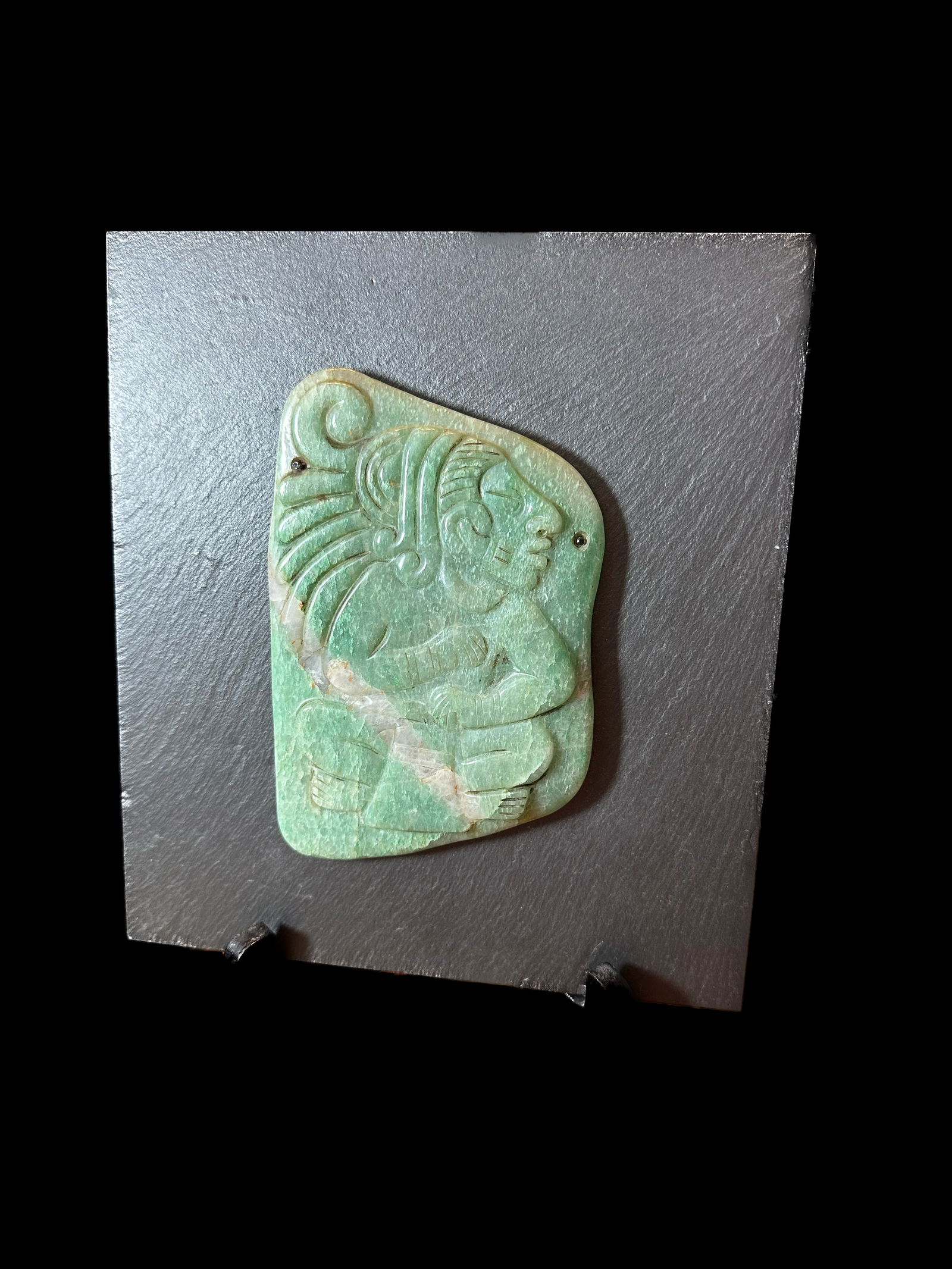 Small Mayan jade carving mounted on slate (1 of 3)