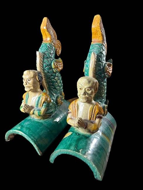 Two chinese roof tiles: Two Chinese roof tiles measuring 14" x 5 14" and 13 3/4" x 5 1/2" in.