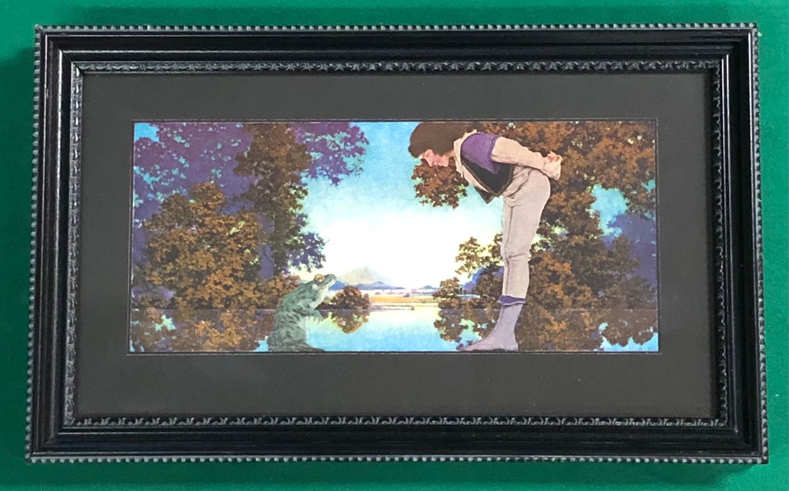 Maxfield Parrish, American (1870-1966): Titled, "Knave and Frog" in antique frame measuring 7 1/2 x 12 1/2"