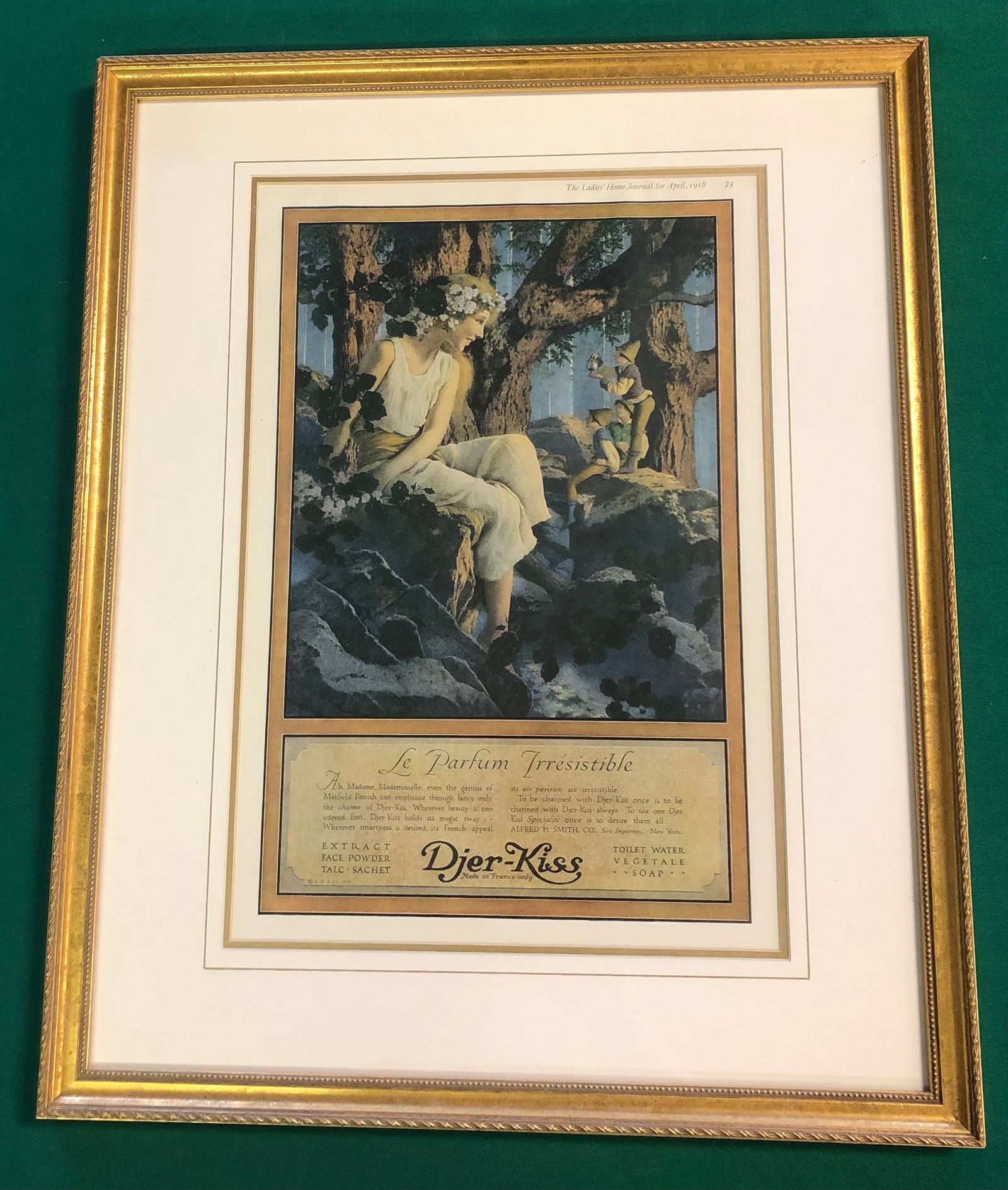 Maxfield Parrish, American (1870-1966): Titled "La Parfum Irresistible" perfume ad for Djer-Kiss in gold frame measuring 21" x 17"