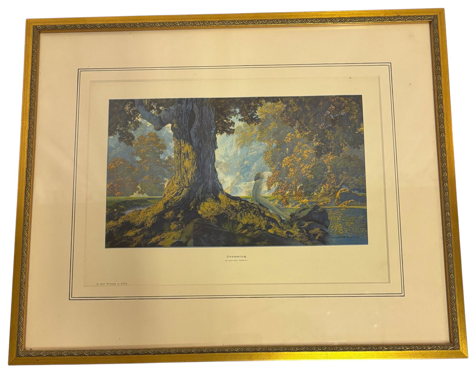 Maxfield Parrish, American (1870-1966): A Maxfield Parrish, titled "Dreaming" measuring 14" x 17"