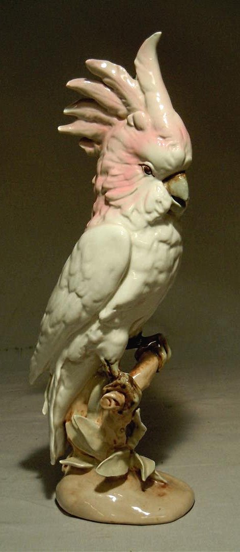 Royal Dux Cockatoo: Royal Dux cockatoo measuring 15 1/2" x 6." Porcelain figure has pink triangel and "Royal Dux" on base (see photos).