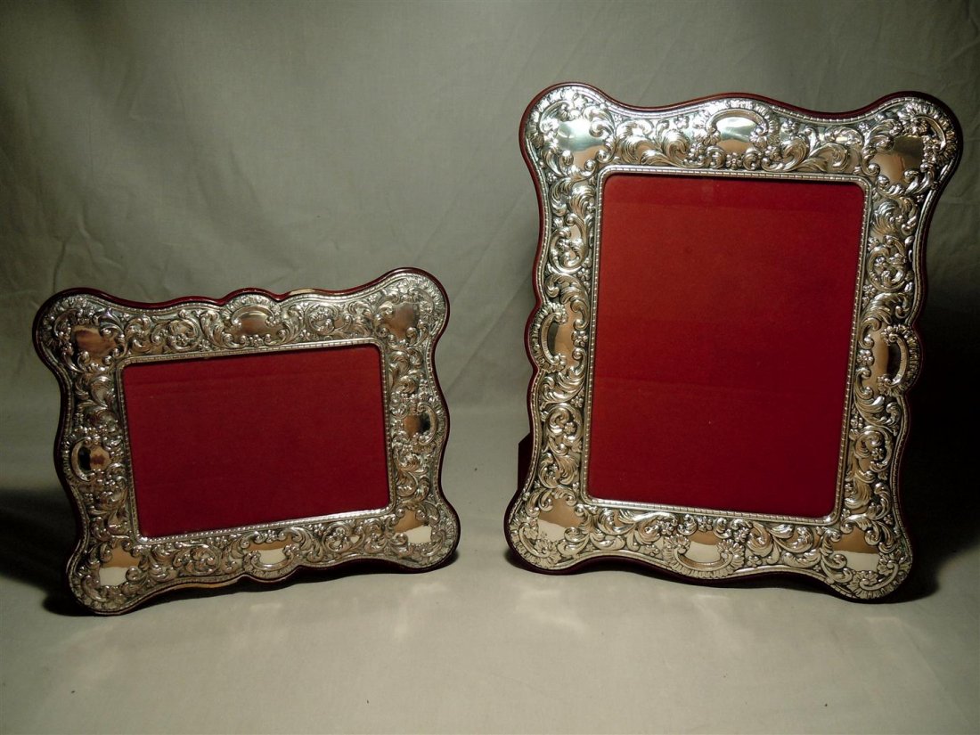 Two Sterling and Wood Valori Frames: Two sterling and wood "Valori" picture frames. Both frames are marked "925" with star touchmark. Frames measure 9 1/2" x 11" and 11 1/2" x 13 3/4."