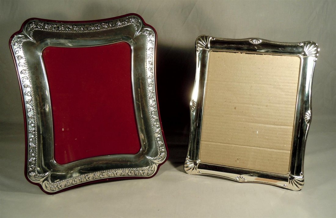 Two Sterling Silver Picture Frames: Two sterling silver picture frames. The Valori frame on the left measures 13 1/4" x 10 3/4" and the frame on the right measures 12" x 10."
