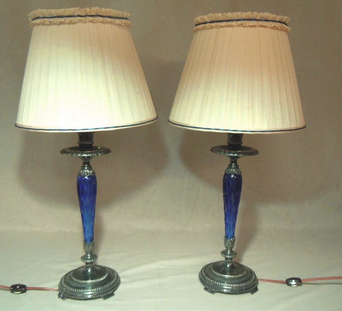 Pair of Pairpoint Cobalt Blue Lamps: A pair of pairpoint cobalt blue lamps measuring 24"H with shades and 14 1/2"H without.