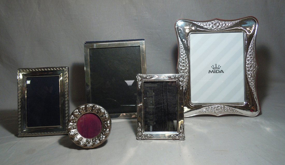 Lot of Miscellaneous Sterling and Silver Plate Frames: Lot of Miscellaneous Sterling and Silver Plate Frames ranging in height from 4 1/2" to 13"