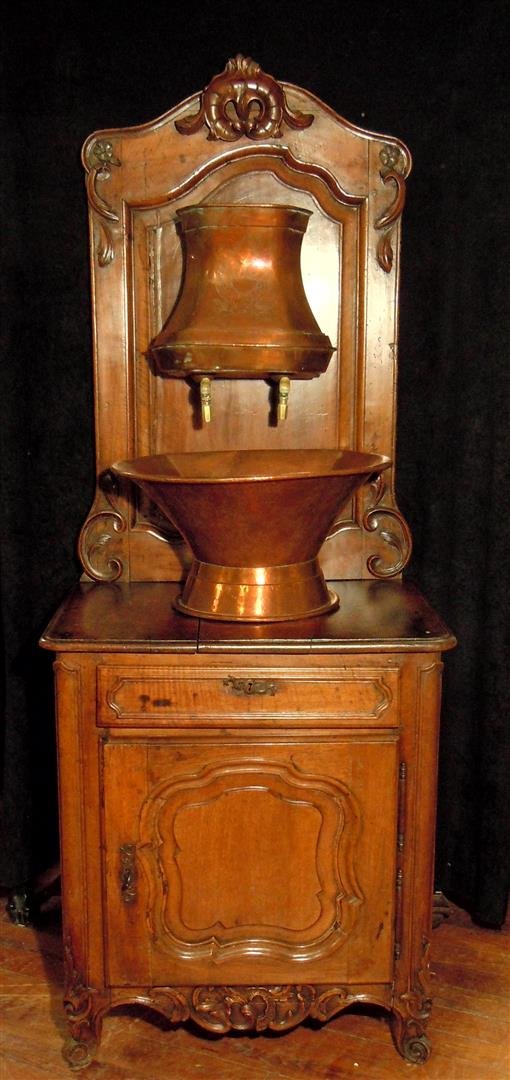 Fruitwood Provincial Lavabo Stand: A fruitwood provincial lavabo stand with copper c. 1790. The lavabo measures 27" x 20" x 70."