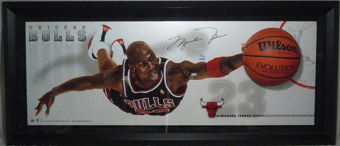 Michael Jordan Basketball signed "Breaking Through": Michael Jordan autographed three-dimensional poster entitled "Breaking Through." The basketball is three dimensional.The poster is limited to 100 pieces and authentication paperwork accompanies the pi