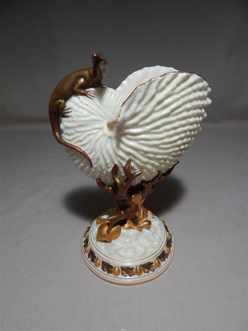 Royal Worcester Nautilus Shell Vase: Royal Worcester nautilus shell vase with lizard. The vase has the Royal Worcester mark on underside (see photo) and measures 9 1/4"H.