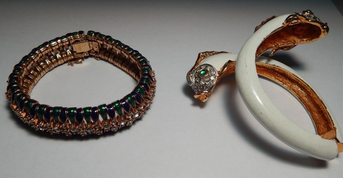 2 Bracelets KJL and Ciner: The enamel and gold tone is marked KJL and the articulated gold tone and enamel is marked Ciner.