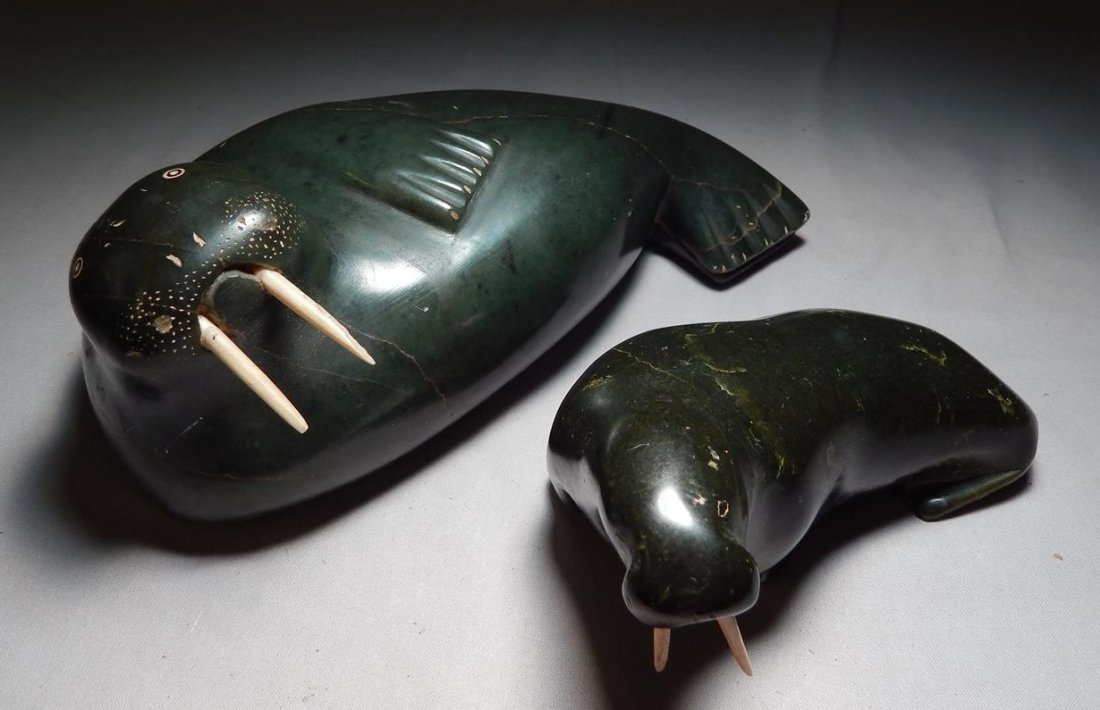 Inuit Hardstone Walrus Carvings.: Two hardstone Inuit carvings of Walrus. Measures 4" x 10 1/2". 2 1/2" x 6 1/2".