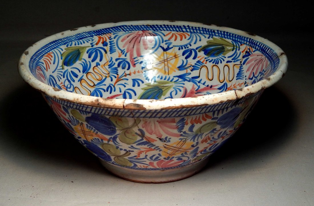 Antique Multi-Colored Spanish Bowl: An Antique Multi-Colored Spanish Bowl with early staple repairs. Measures 5" x 12".