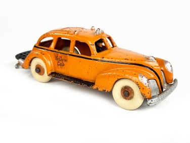 Hubley 1940 Taxi with Fold Down Rack and Cast Iron Chassis