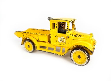 Kauffman Yellow International Dump Truck Cast Iron by Arcade.