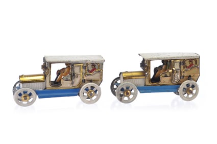 Two White and Gold Distler Limousine Penny Toys circa 1910