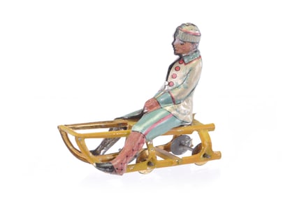 Boy on Sled Penny toy by Meier