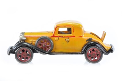 Arcade REO Cast Iron Car in Yellow