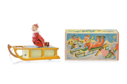 Boxed Gescha Kid Snow Sledding Tin Windup