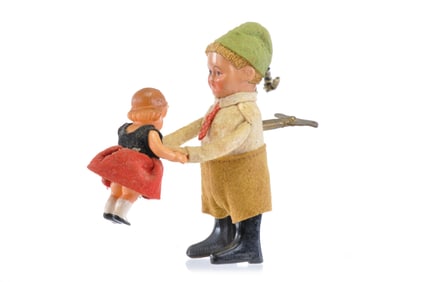 Schuco Man and Child Windup Tin and Celluloid, Germany