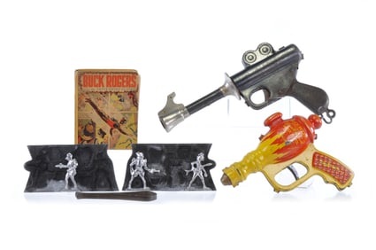 Buck Rogers Space Toy Lot with Daisy Gun & Water Pistol, Lead Figure Mold, and Book