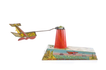 Marx Lucky Stunt Flyer Tin Airplane and Tower