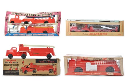 Four Boxed Plastic Fire Trucks and Engines