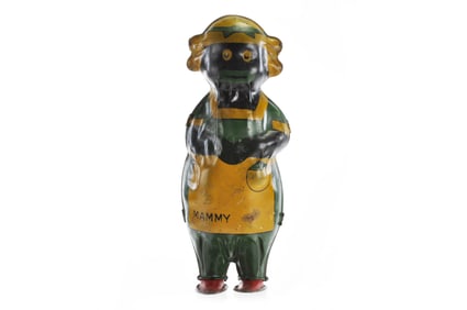 Lindstrom Green and Yellow Dancing Mammy Tin Windup Toy
