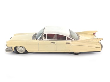 Japanese Tin Litho Yellow Friction Cadillac Works