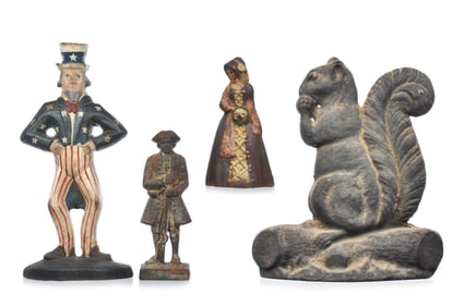 Lot of 4 Cast Iron Doorstops J.W. Fiske Colonial Woman, Squirrel, Colonial Soldier, and Uncle Sam