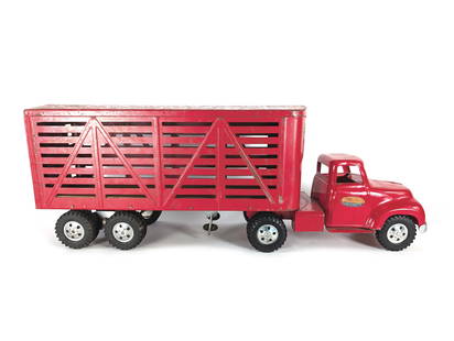 1950's Pressed Steel Tonka Livestock Truck & Trailer: This pressed steel toy has scratches and rubs in the paint. The decals are intact. It has rubber tires, and the hubs are intact. The bumper and rear door are intact. It is approximately 23.5" long.