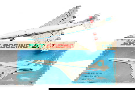 Nomura T.N. Batt. Op. Supersonic Transport SST Boeing 2707 PAN AM Plane Boxed: This is a tin Nomura T.N. battery-operated Supersonic Transport SST Boeing 2707 Pan Am airplane in the box. One battery terminal is broken off but included in the box for possible repair, so we were u