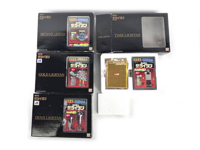 Gold Lightan Chogokin Lot of Four Diecast Robots: Set of four Gold Lightan robots, from a pre-Transformers concept of lighters hiding in plain sight, then turning to robots. Toys come with paperwork and outer boxes as shown. Adult displayed, near new