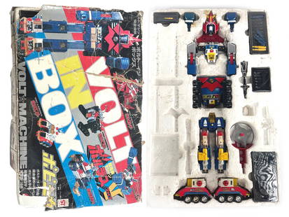 Voltes V or Volt-In-Box Japanese Diecast Robot: Pre-Godaikin release of Voltes V for the Japanese market. This rendition of the toy has earlier sticker variations and heavy diecast. Cockpit on jet missing, and belt yellow square chipped. Otherwise,