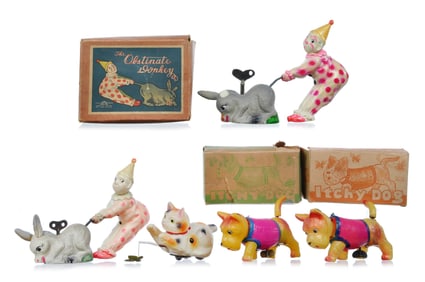 (4) Japanese Celluloid Windup Toys Clown, Dogs, Cat