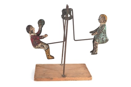 Gibbs Children on See-Sew Motion Tin Toy