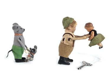 Schuco Man with Mouse and Man with Girl Windup Toys
