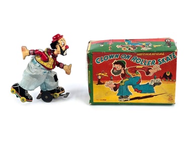 TPS Clown on Roller Skates Tin Windup