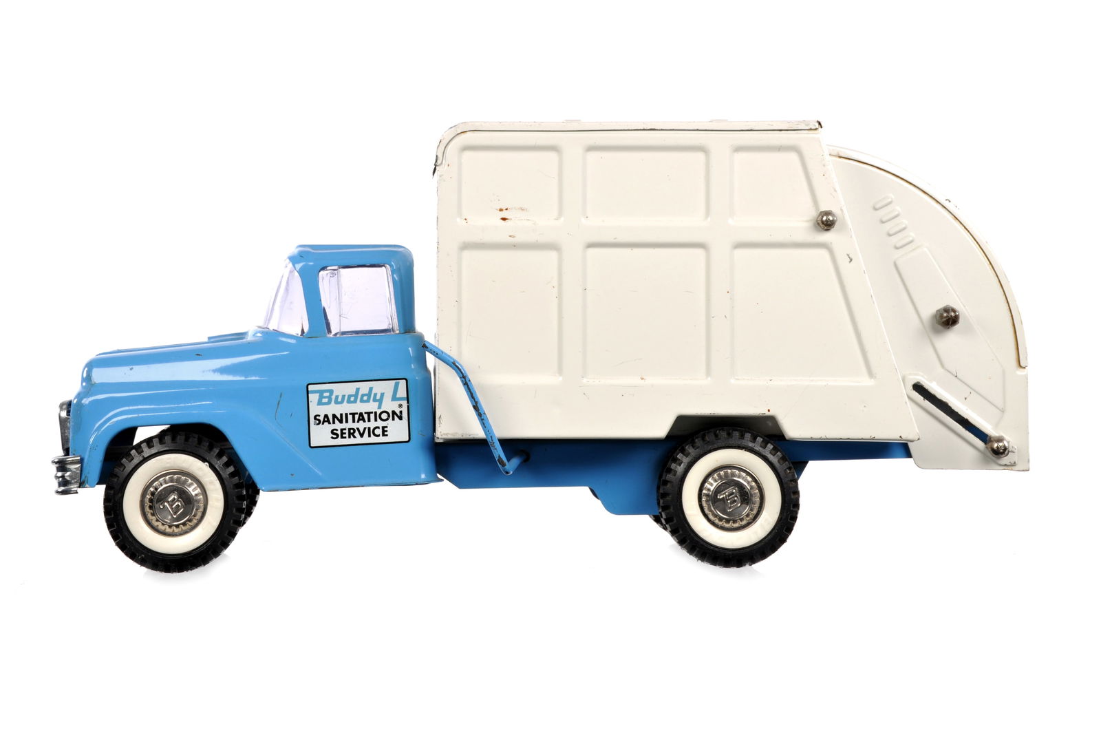 1960s Buddy L Sanitation Service Garbage Truck: This is a 1960s pressed steel Buddy L Sanitation Service garbage truck. It is in very good working order and measures approximately 16.5" L.