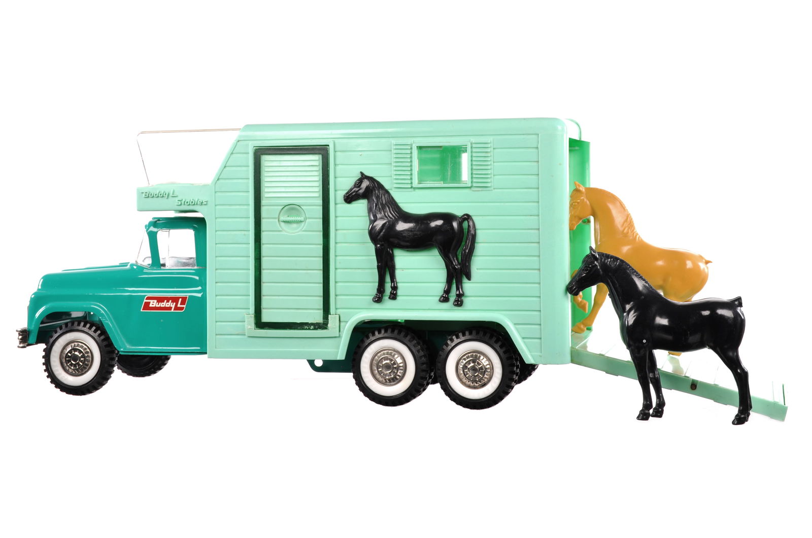 1960s Buddy L Stables Horse Van Pressed Steel Green: This is a Buddy L No. 5463 Buddy L Stables horse van in green, it comes with 2 horses that are missing their tails, the side door’s bottom casing is loose, it measures approximately 16.5" L.