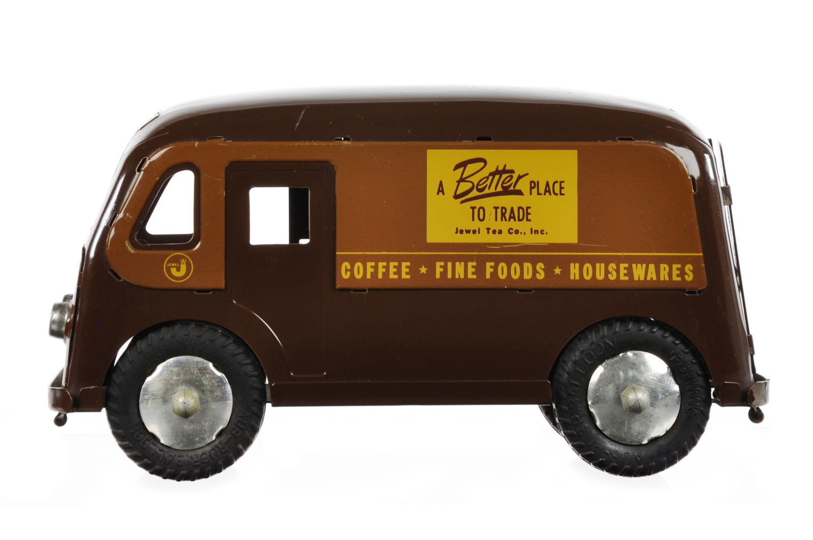 Banner Pressed Steel Jewel Tea Co. Van: This is a Banner pressed steel Jewel Tea Co. Van with Auburn rubber tires. It measures approximately 9.25" L.