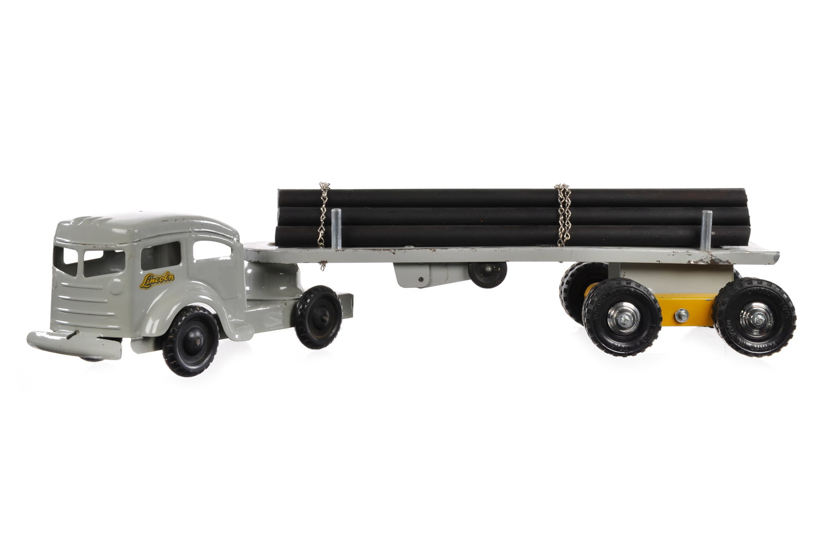 Rare Lincoln Pressed Steel Lumber Hauler Truck: This is a rare Lincoln pressed steel lumber hauler truck, it is in great condition and measures approximately 23.5" L.