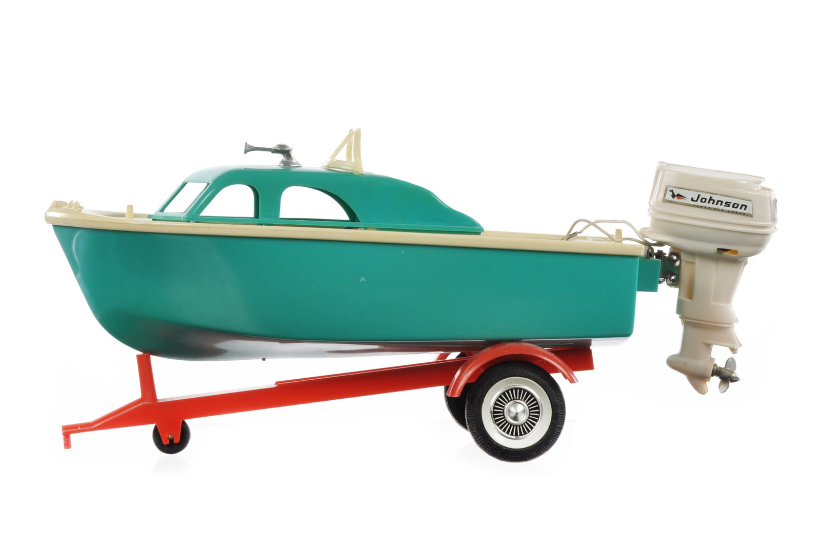 Fleetline Weekend Skipper II Batt. Op. Boat & Trailer: This is a Fleetline Weekend Skipper II battery-operated boat and trailer with Johnson motor. It operates on two C batteries, has been tested, and works. It measures approximately 12" L.