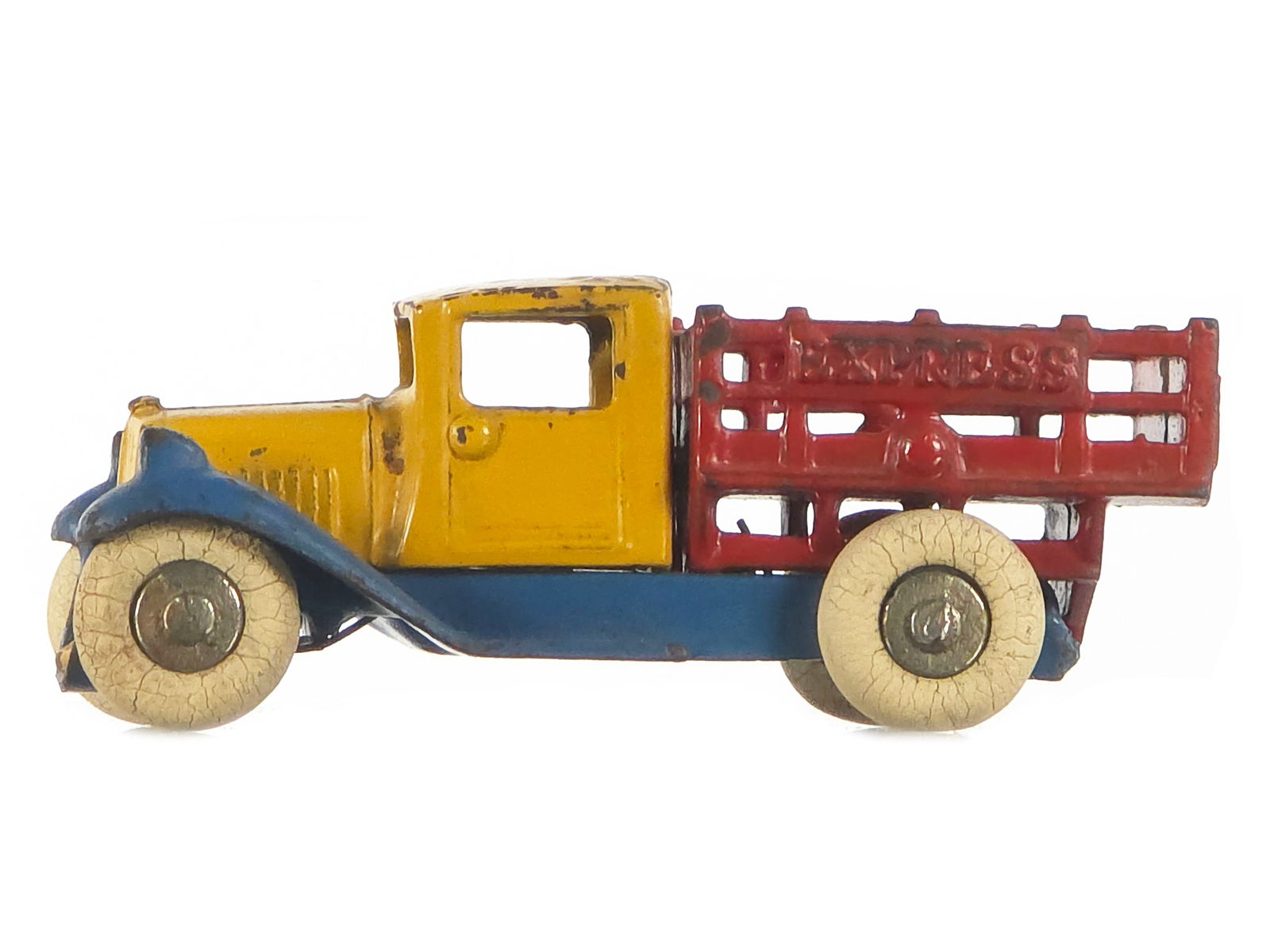 Incredible 1932 Kilgore Express Truck Cast Iron: Multi-color and clean Kilgore 33 Express Truck. This design is a one-year-only, circa 1932, and a take-apart design. Toy has original tires and proper paintwork. Beautiful original cast iron toy. It m