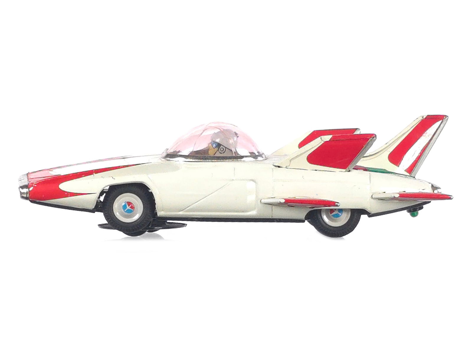 1950s Rare Cragstan/Alps Fire Bird III Batt. Op. Space Car: This is a 1950s rare Cragstan/Alps Firebird III battery-operated Japanese tin litho future car. It has been tested and works, with a clean battery compartment free of corrosion. The car measures appro