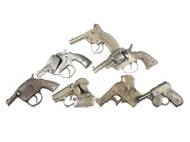 (7) Assorted Cap Guns