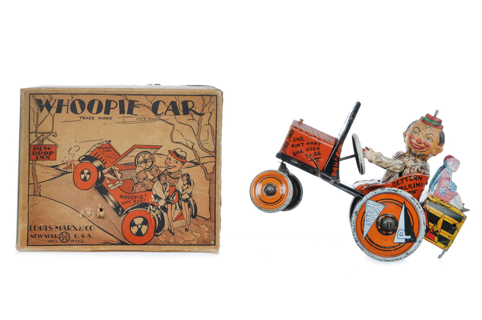 1920s Marx No. 150 Whoopie Car Boxed: This is the variation of this car with the two flapper girls on the trunk. The lithography is clean and bright and covered in college pendants. The windup mechanism works and supplies all the crazy ca